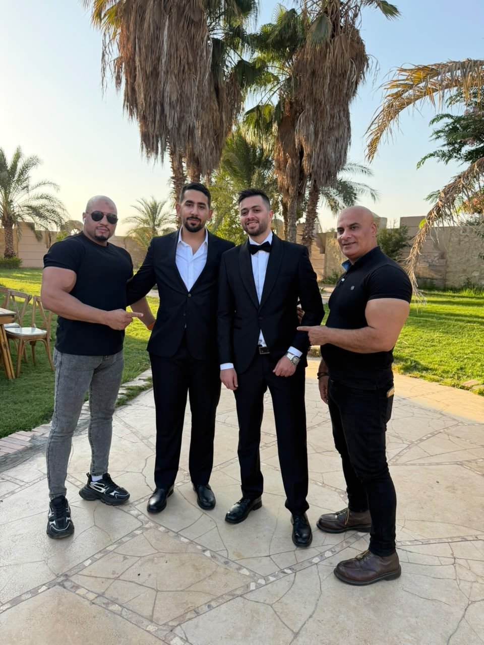 Bodyguards protecting the groom at a wedding
